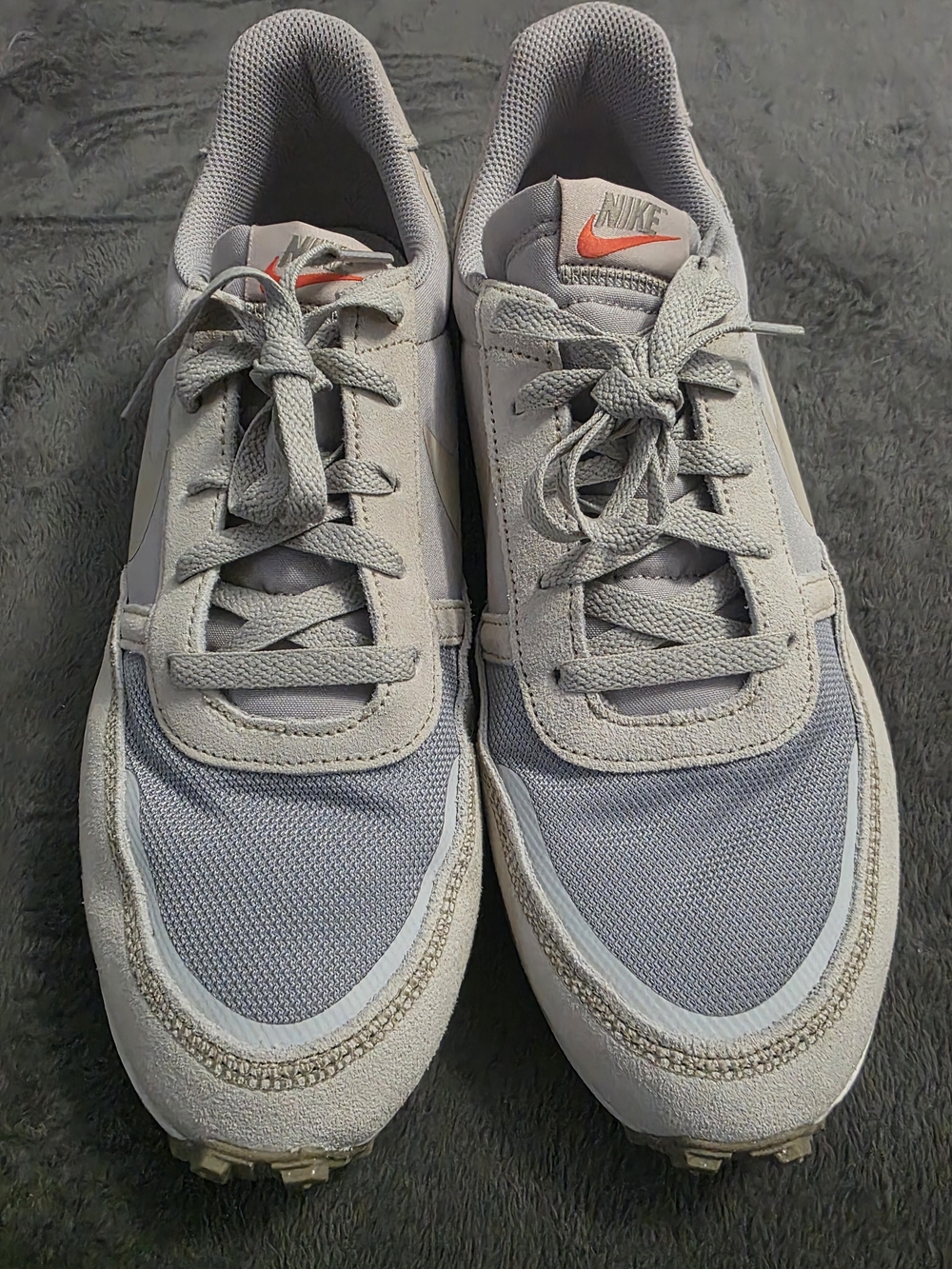 Nike Waffle  sneakers in light iron ore, featuring a grey mesh.